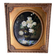 Large still life with white roses in an old gilded oval frame.