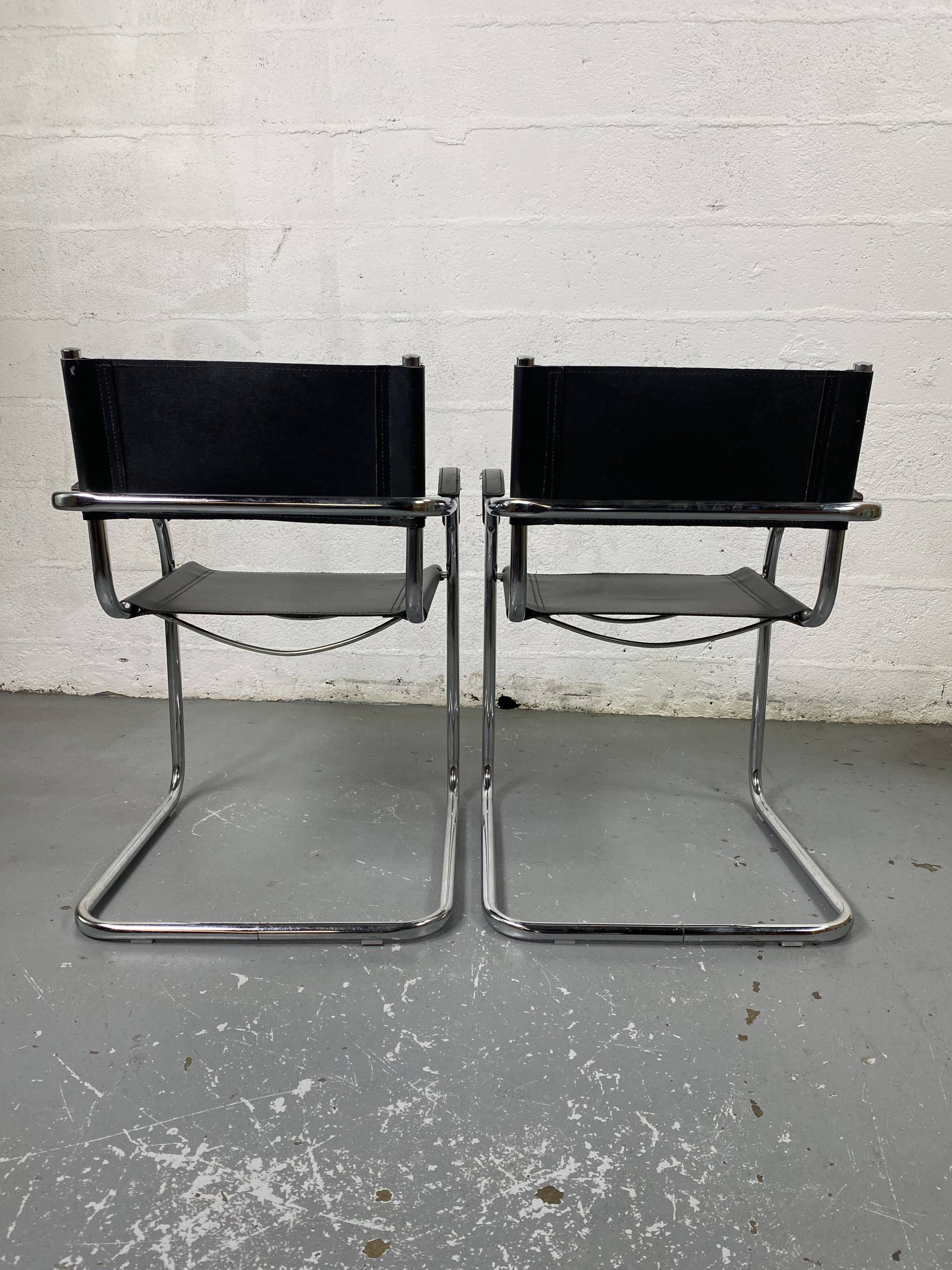 Pair of design armchairs in imitation leather chrome