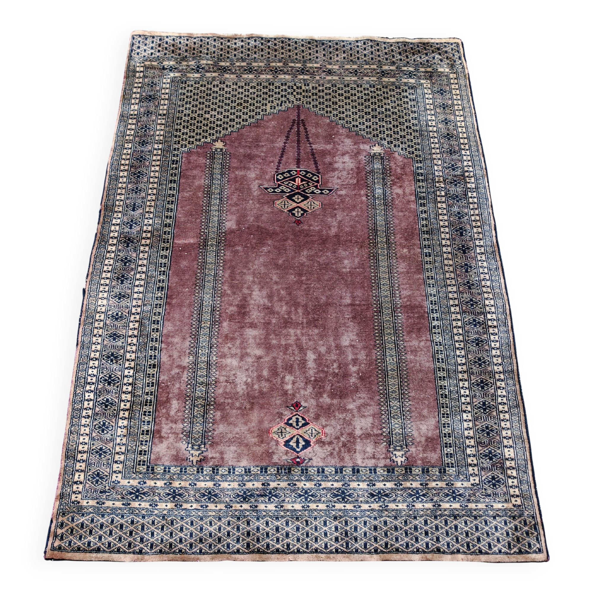 Vintage Anatolian prayer rug made of hand-knotted wool.