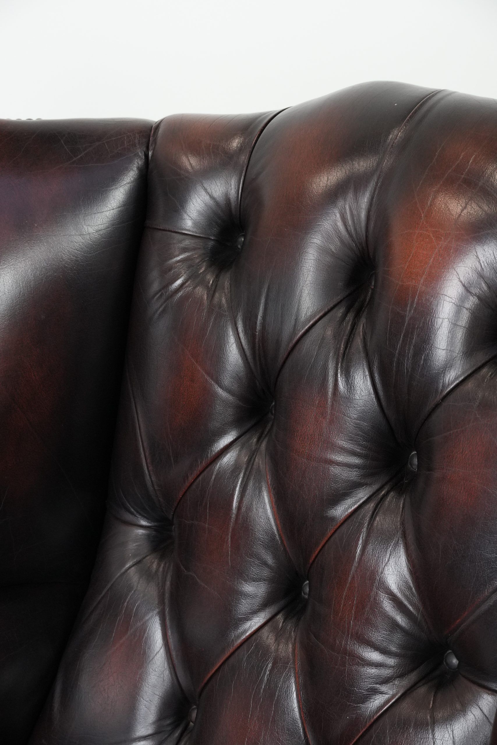 Cowhide leather Chesterfield wingback armchair in classic English style