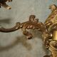 Paire d'appliques murales antiques bronzées à bougie années 1920