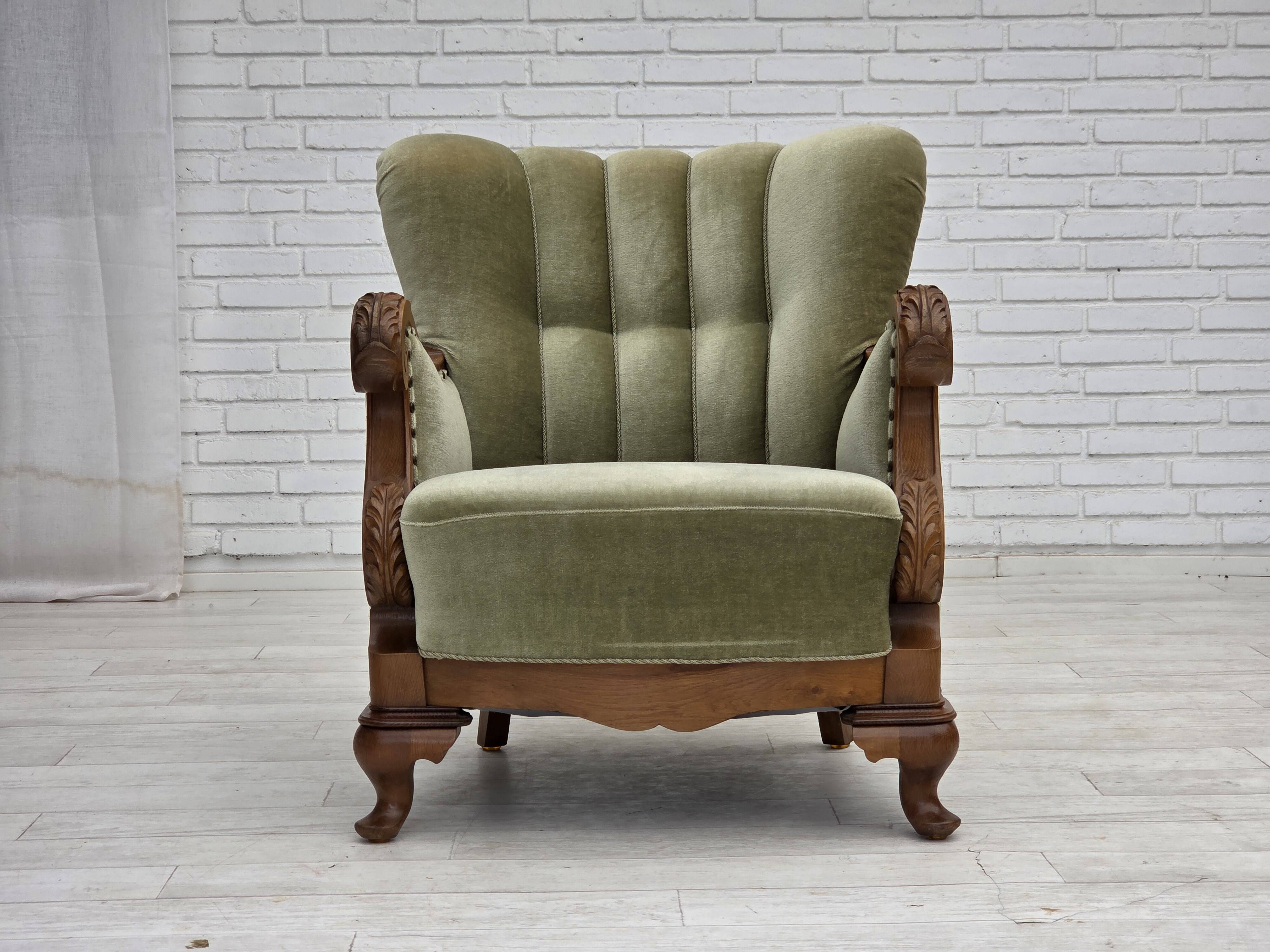 1960s, Danish armchair, green furniture velour, carved oak wood.