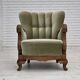 Fauteuil danois des années 1960, velours vert, bois de chêne sculpté.