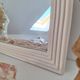 Miroir biseauté et mouluré beige