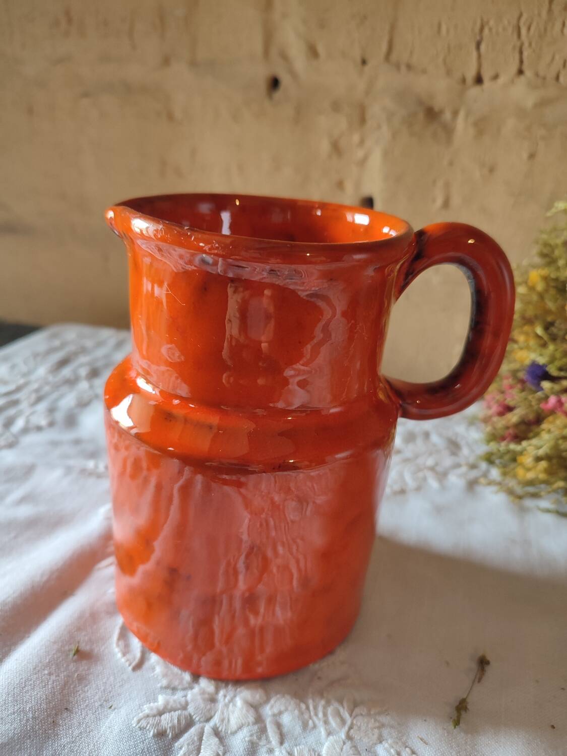 Pitcher vase in orange stoneware