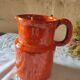 Pitcher vase in orange stoneware