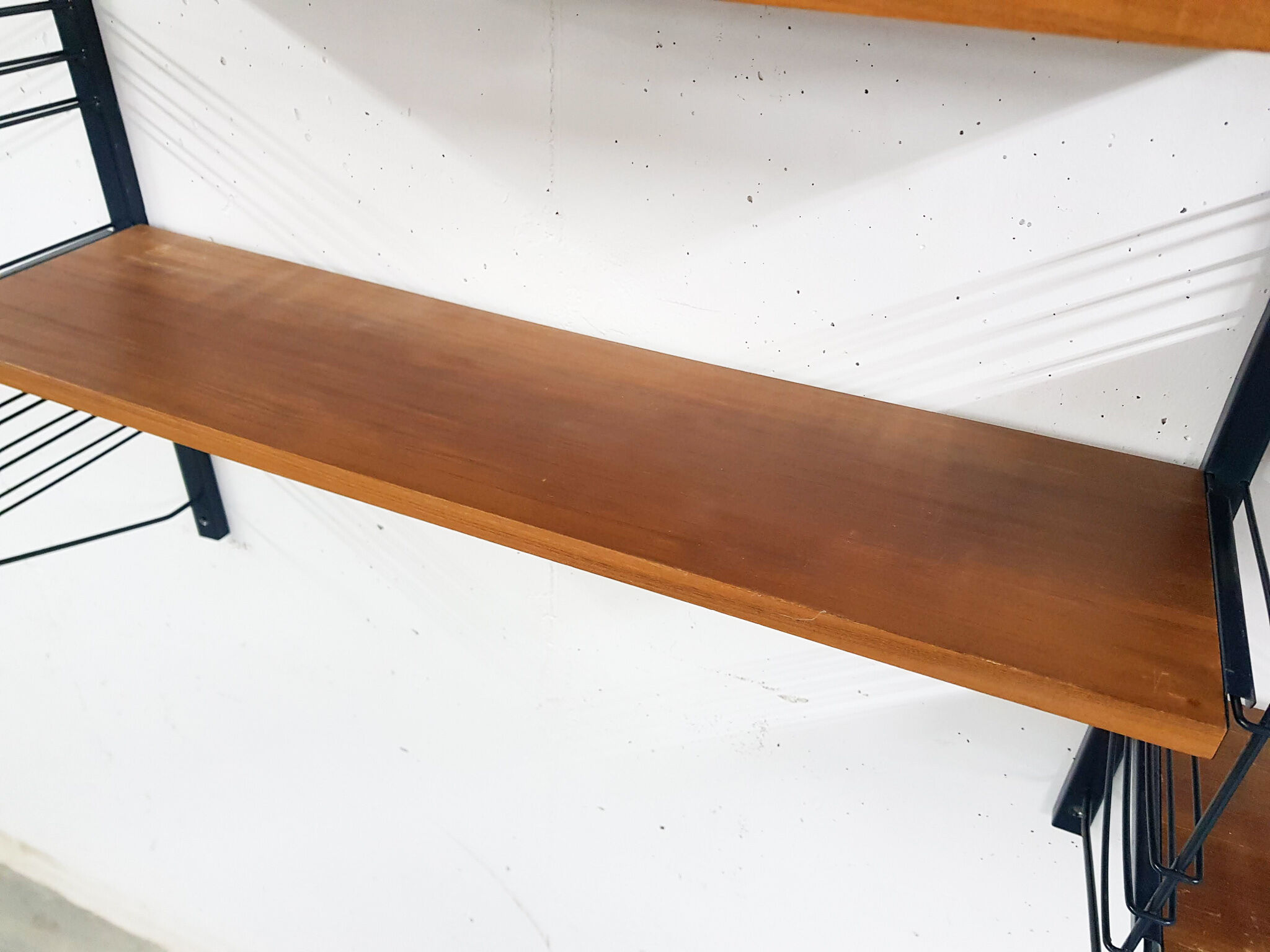 Mid-century book shelves in the style of Tomado