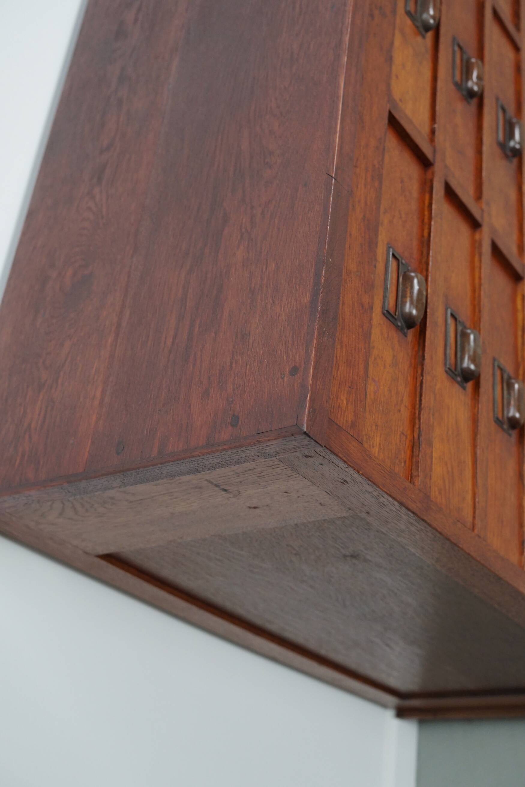 Large Dutch oak apothecary / filing cabinet or sideboard, 1930s