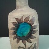 Bottle vase. ceramic enamelled with a flower. Mid-20th. Ht 21.5 cm