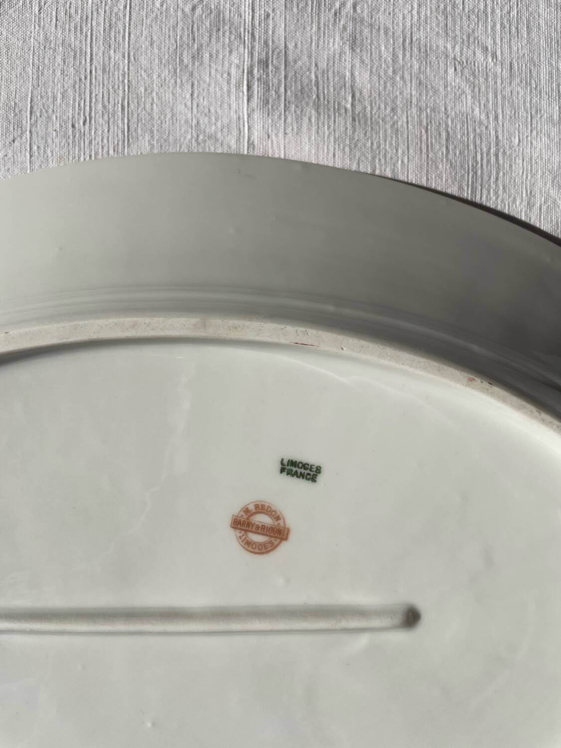 Set of 2 Limoge porcelain dishes, floral pattern.