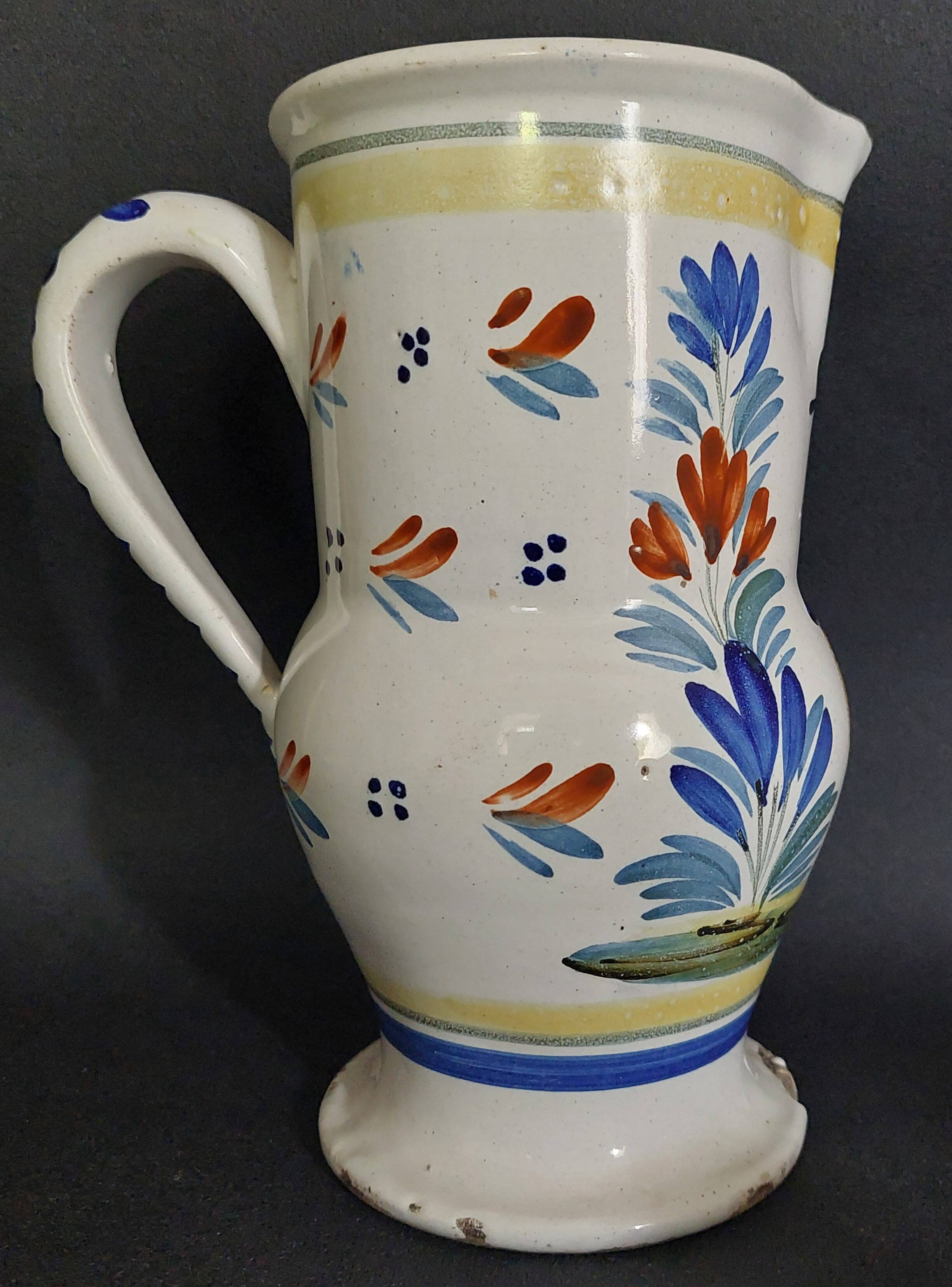 HB Quimper earthenware pitcher, late 19th century character