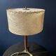 Elegant table lamp with a slender teak body on a tripod brass base, Germany, 1960s.