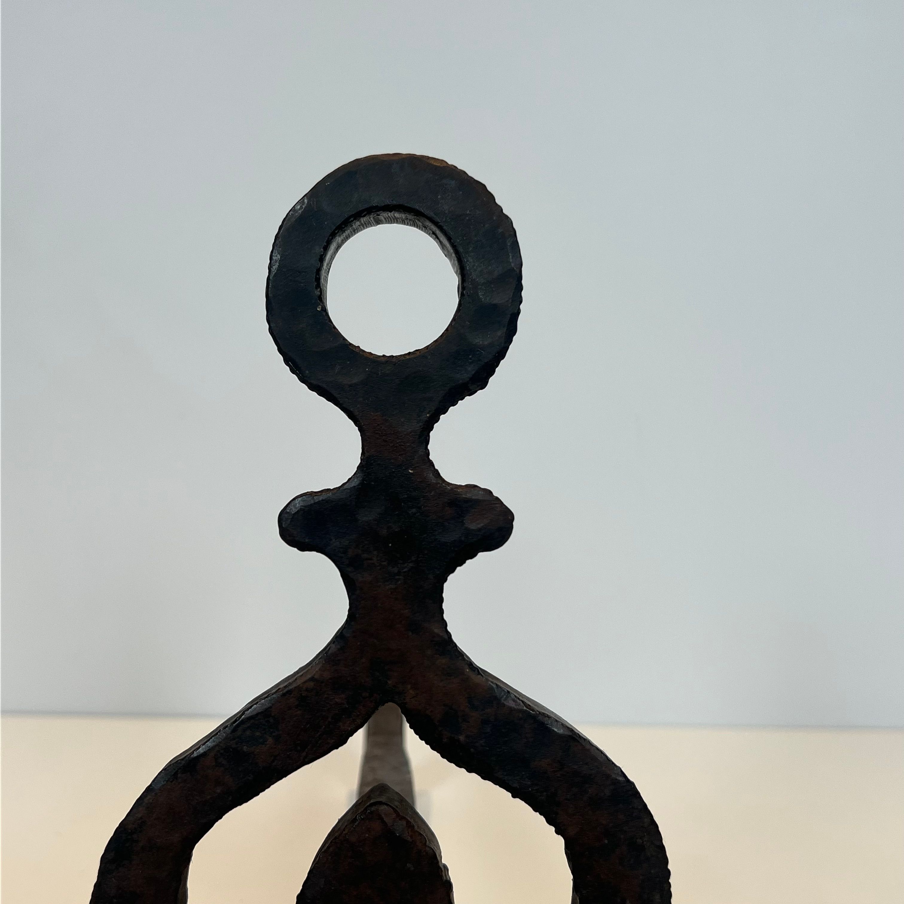 Pair of modernist wrought iron fire dogs.