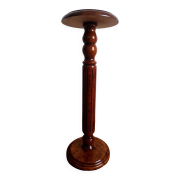 Wooden column pedestal with moulding.