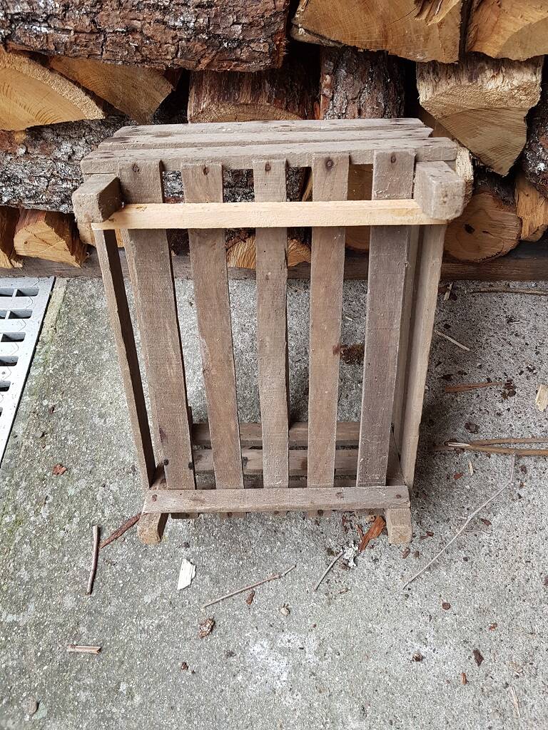 Pair of old fruit crates with wooden shelves
