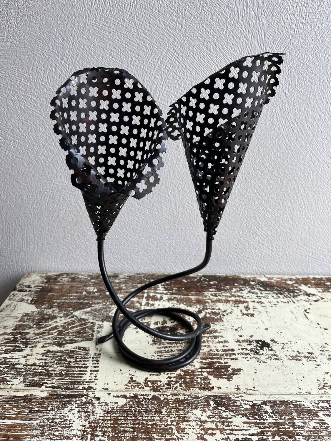 Perforated metal tealight candle holder