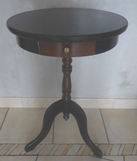 Pedestal table in mahogany style opening through a drawer