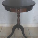 Pedestal table in mahogany style opening through a drawer
