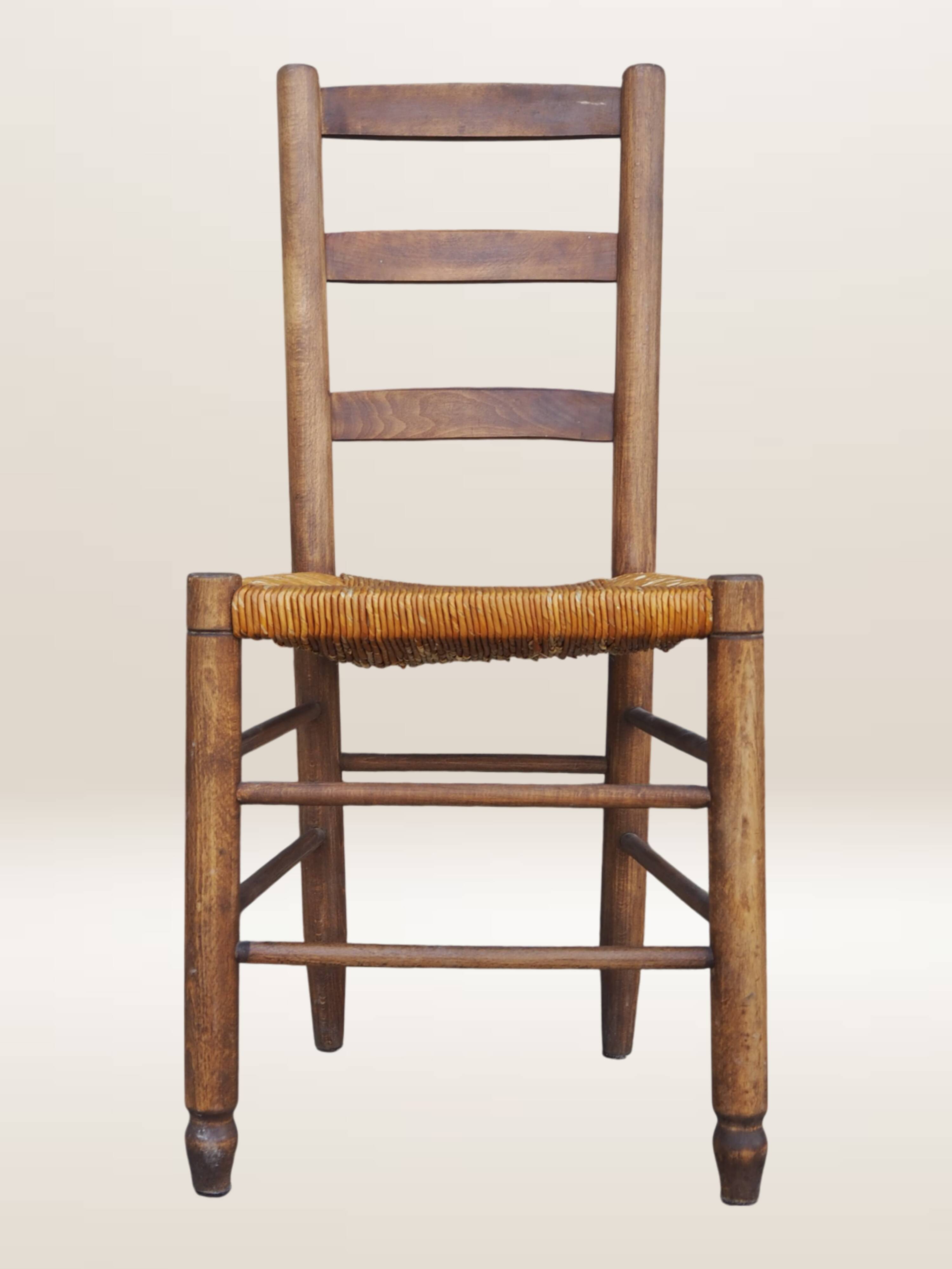 Set of six rush-seated ladderback chairs.