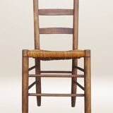 Set of six rush-seated ladderback chairs.