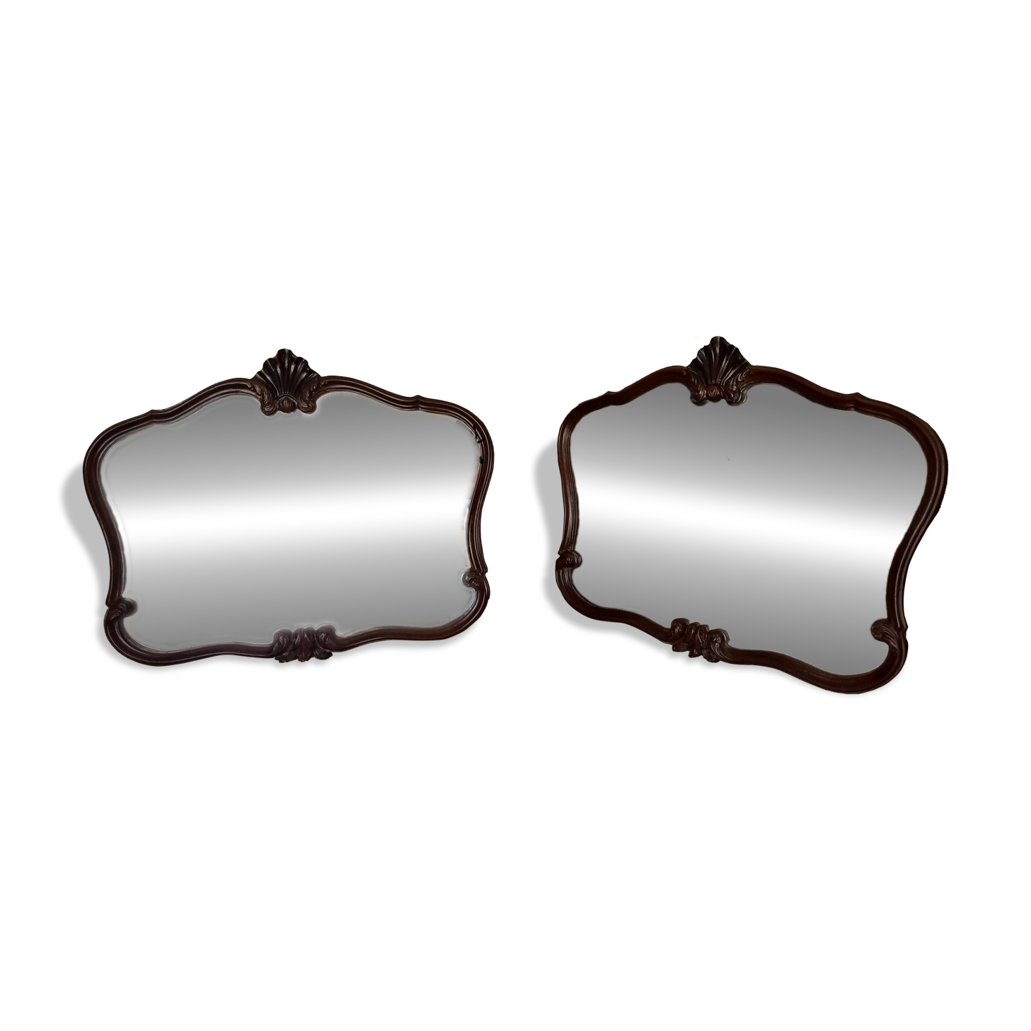 Pair of large antique Rococo style Louis XV mirrors in carved solid wood.