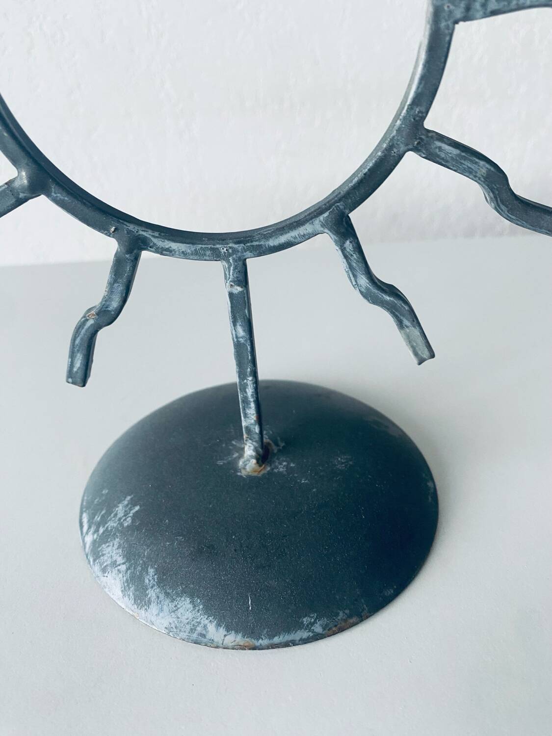 Iron sun candle holder
