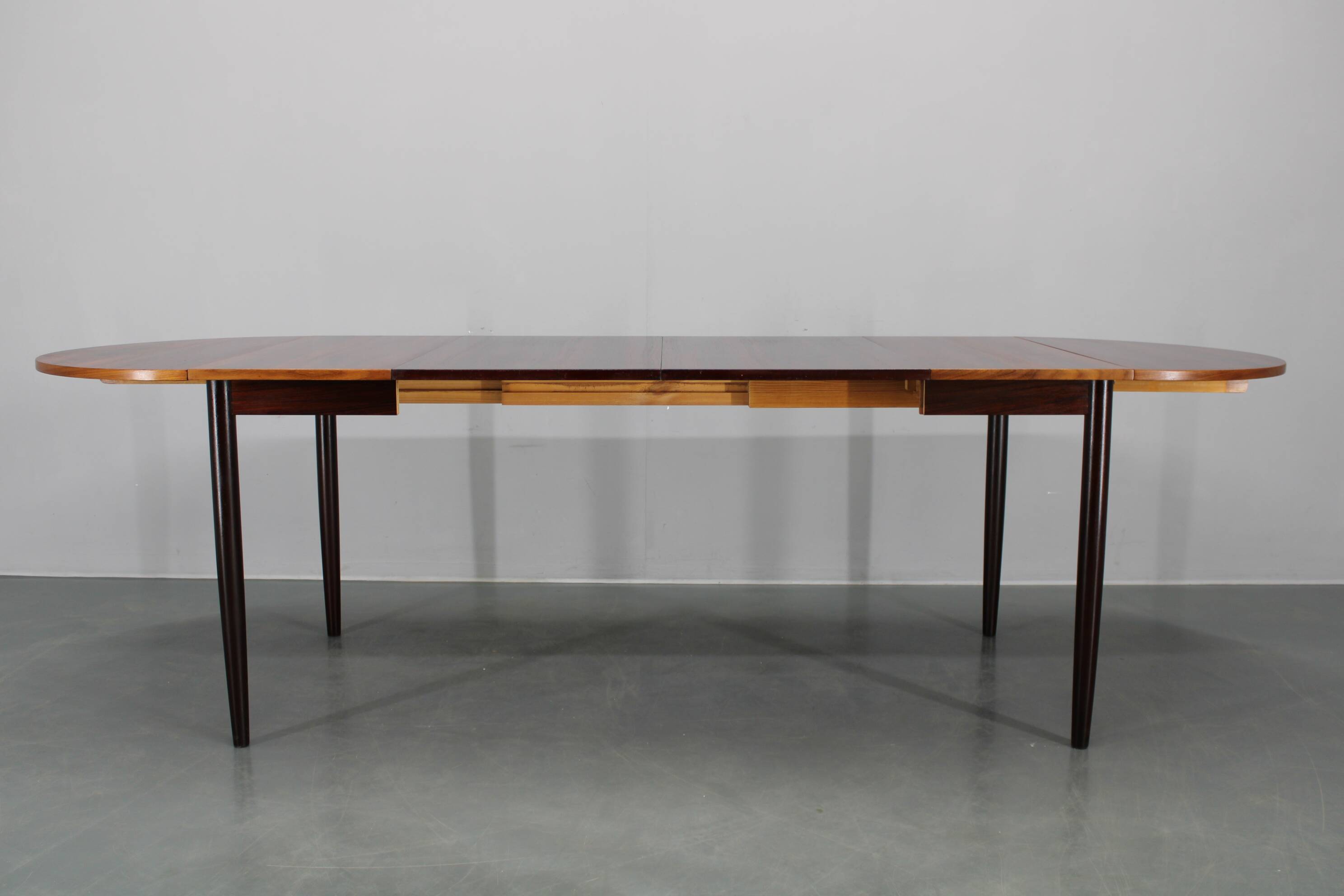 1960s Danish extendable palisander dining table, 4 leaves, restored