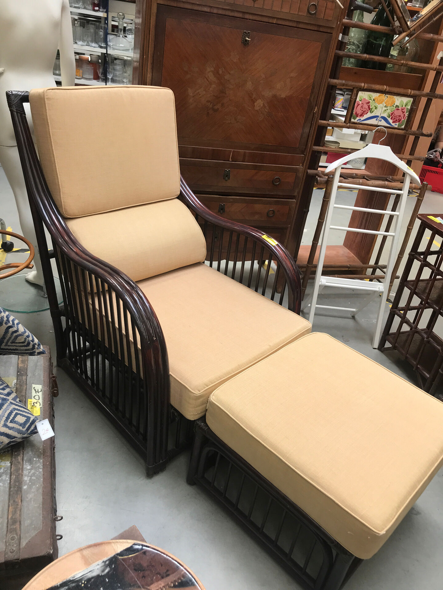 Rattan armchair and footrest