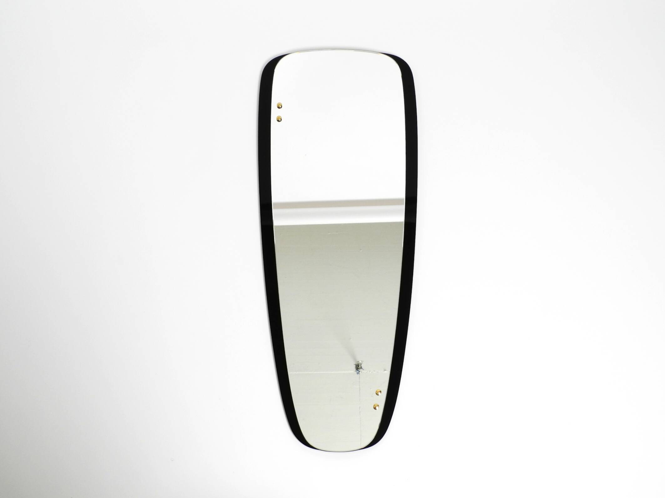 Large Mid Century wall mirror with extraordinary black glass frame