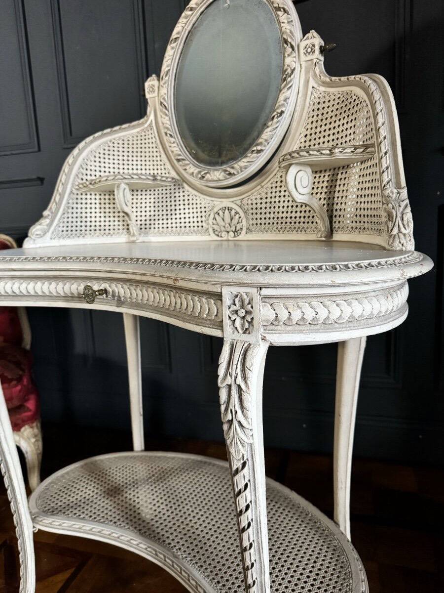 Coiffeuse du XIXe en bois peint et cannage de style Louis XVI