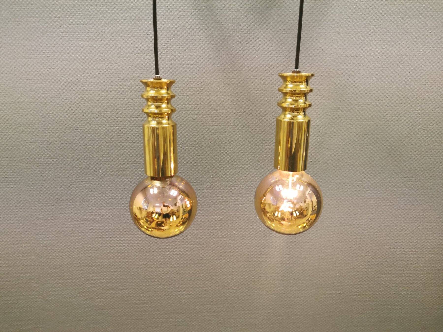 Frimann Goldstar pendant lights made by Philips in the 1970s. Model SPYBALL