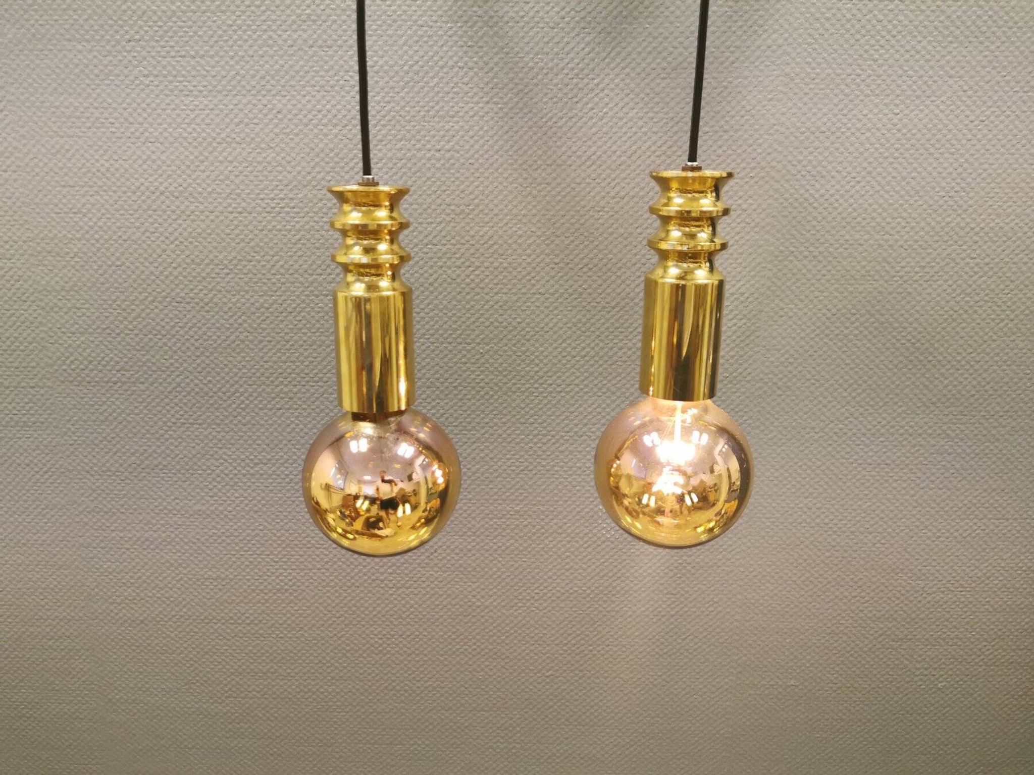 Frimann Goldstar pendant lights made by Philips in the 1970s. Model SPYBALL