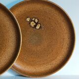 Quatre assiettes de potier en grès émaillé vintages