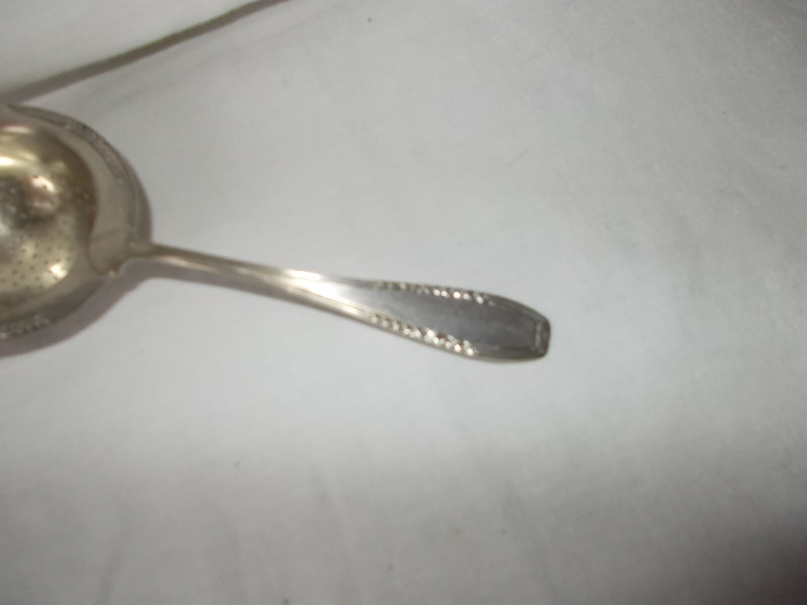 Sugar spoon, silver metal