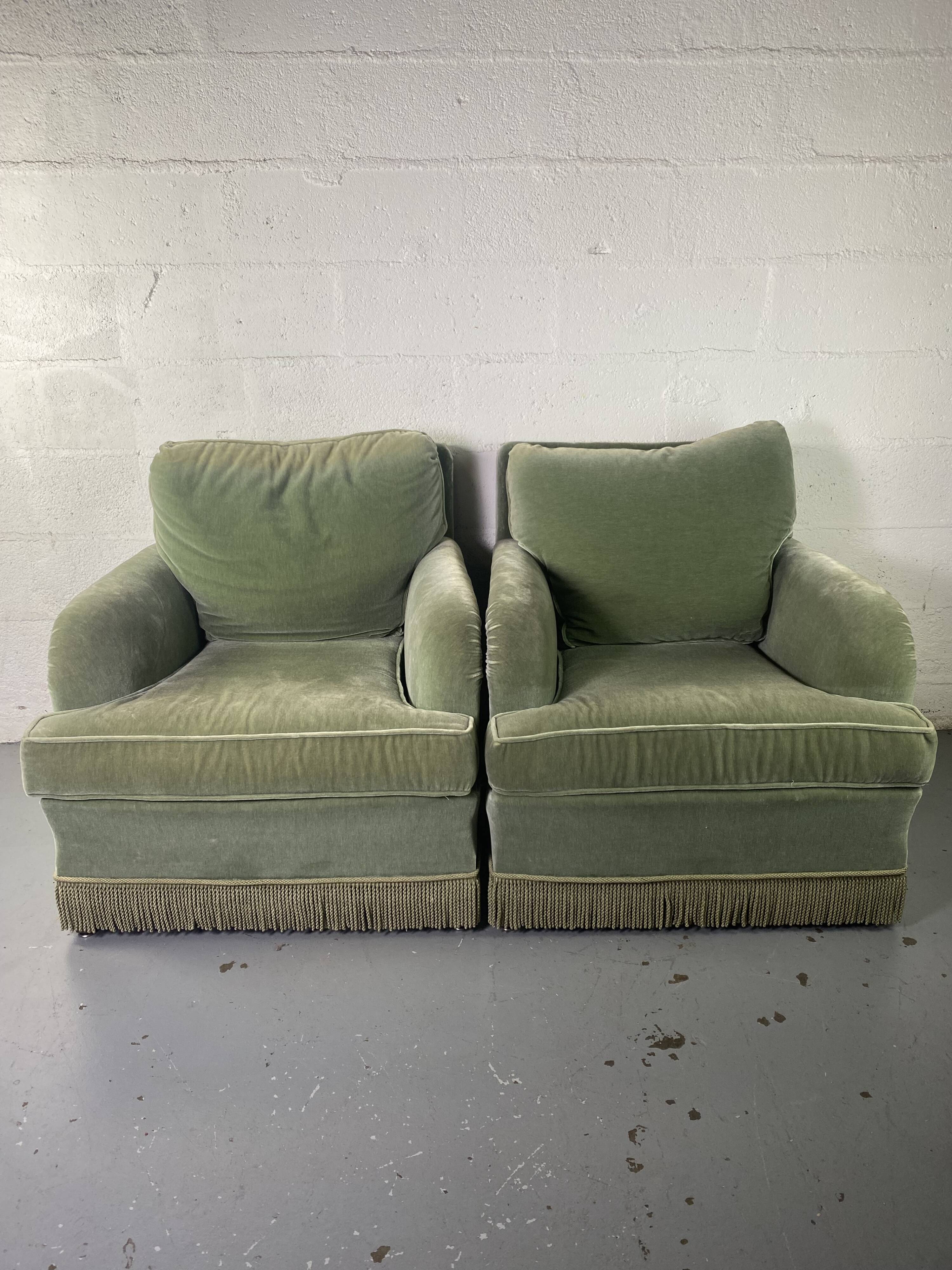 Pair of green velvet club armchairs