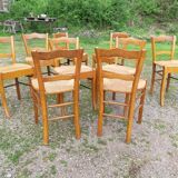 Suite of 9 straw chairs