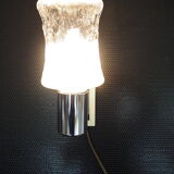 Torch type wall lamp in transparent and white glass