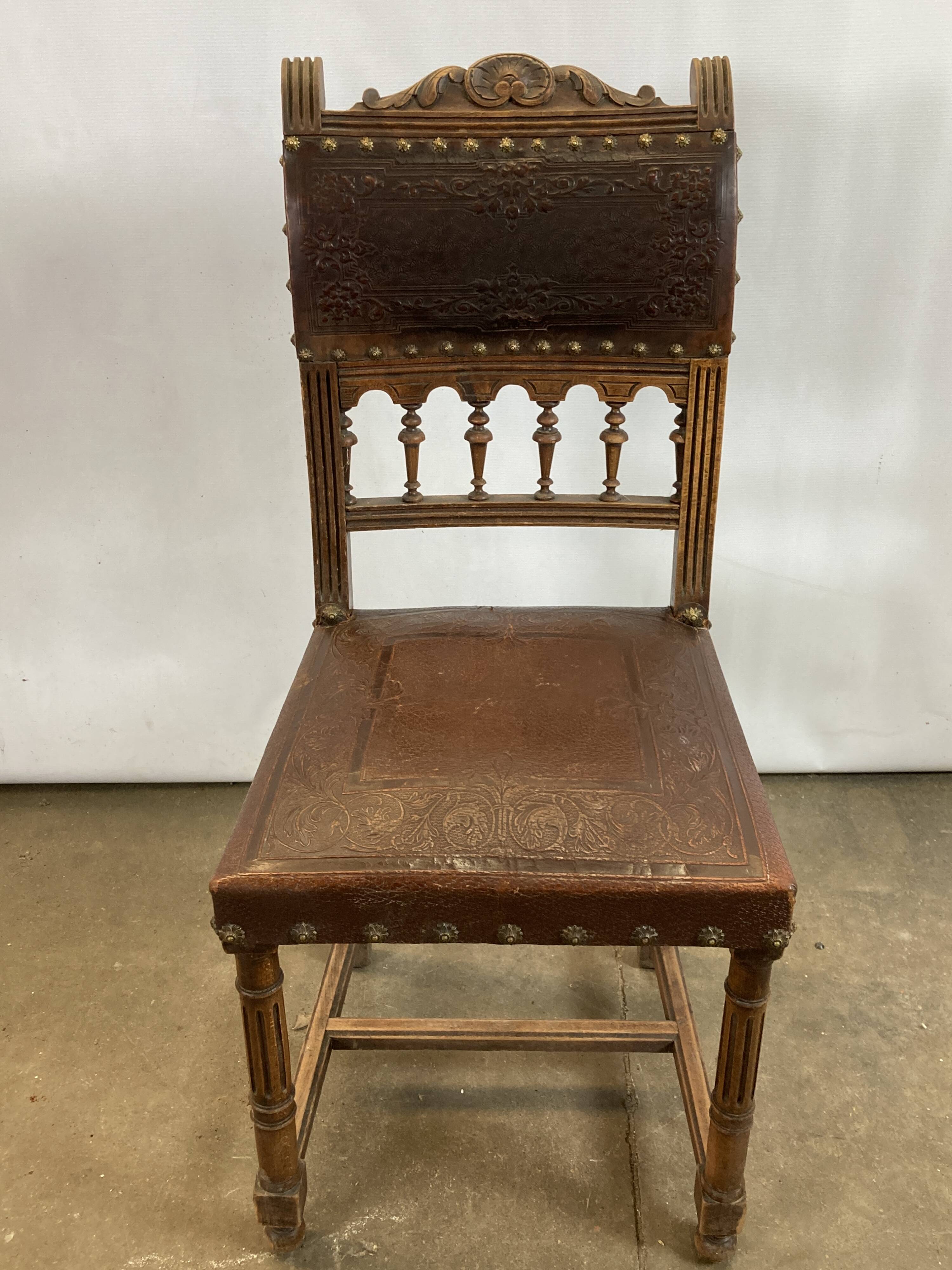Pair of Henry II wooden and leather chairs