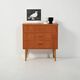 Scandinavian Chest of Drawers in teak with turned birch legs, 1950s