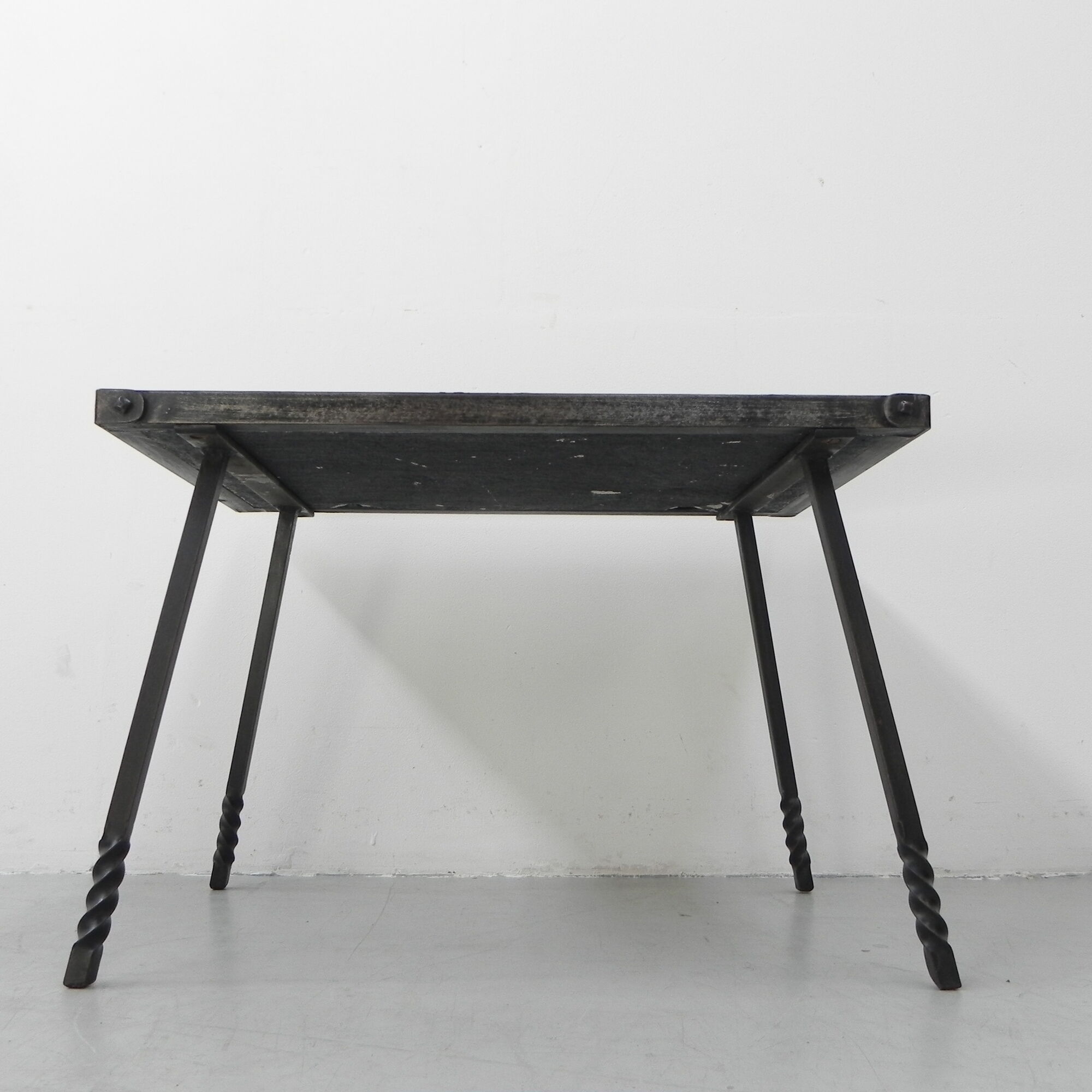 Brutalist coffee table with slate top