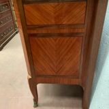 Transition style chest of drawers in rosewood and amaranth veneer, 20th century