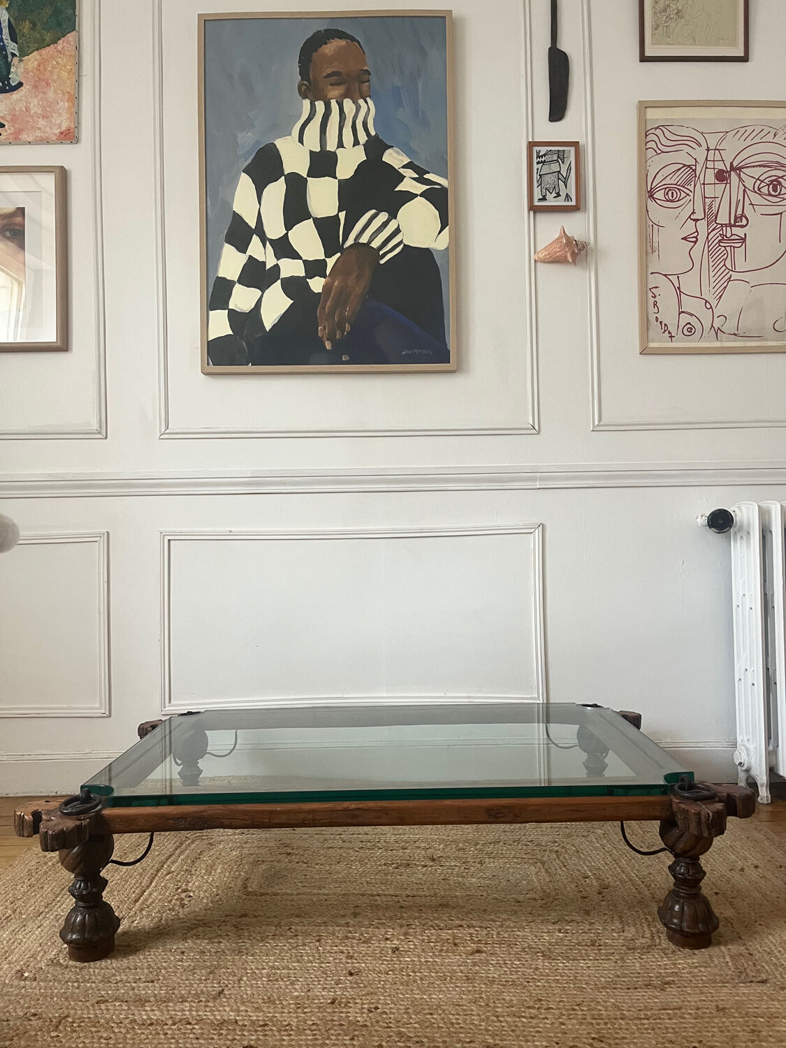 Indian coffee table made of wood and wrought iron.