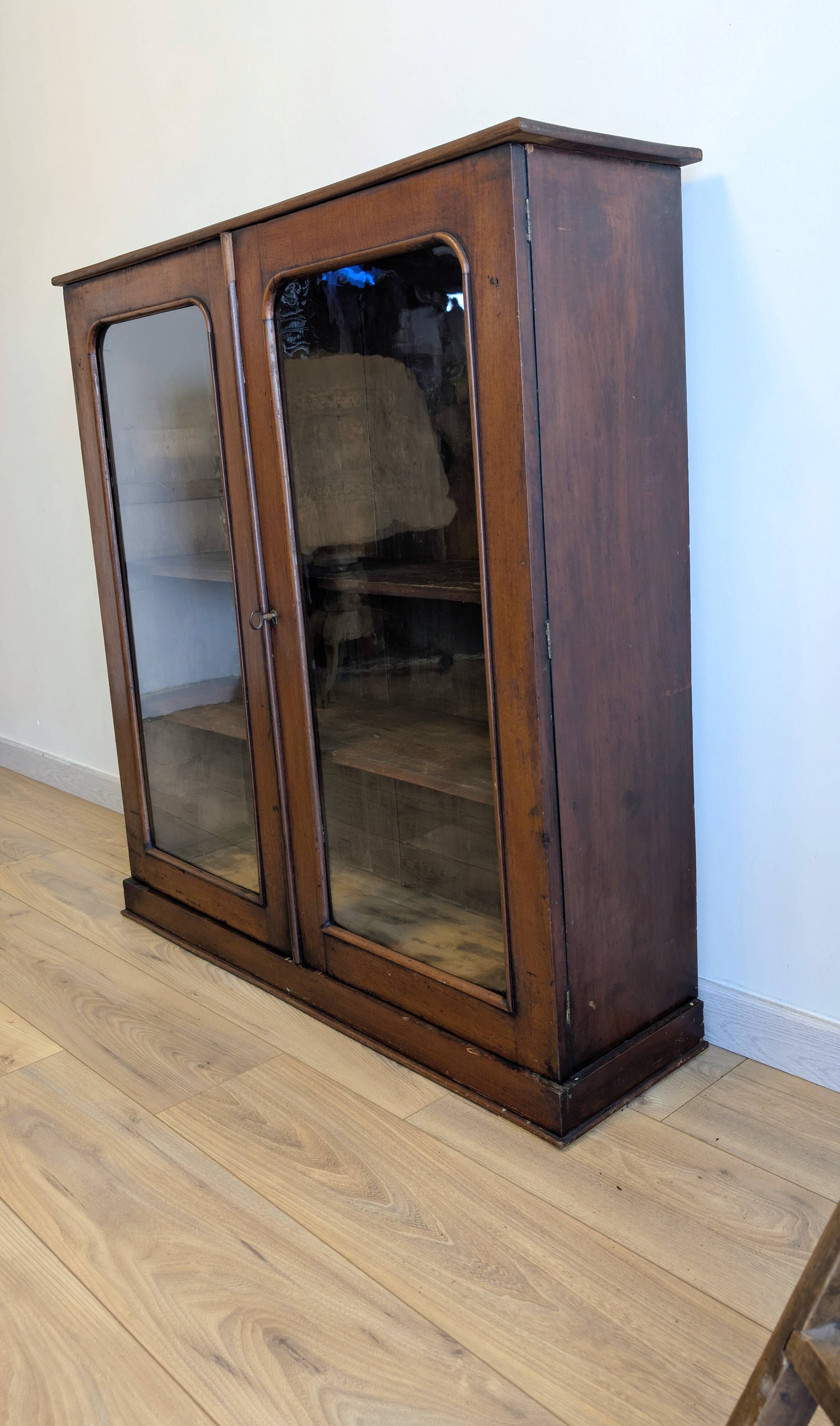 Victorian English mahogany display cabinet, elegant showcase furniture.