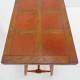 Vintage wooden side table with terracotta top