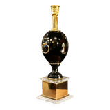 Black lamp in Hollywood Regency style