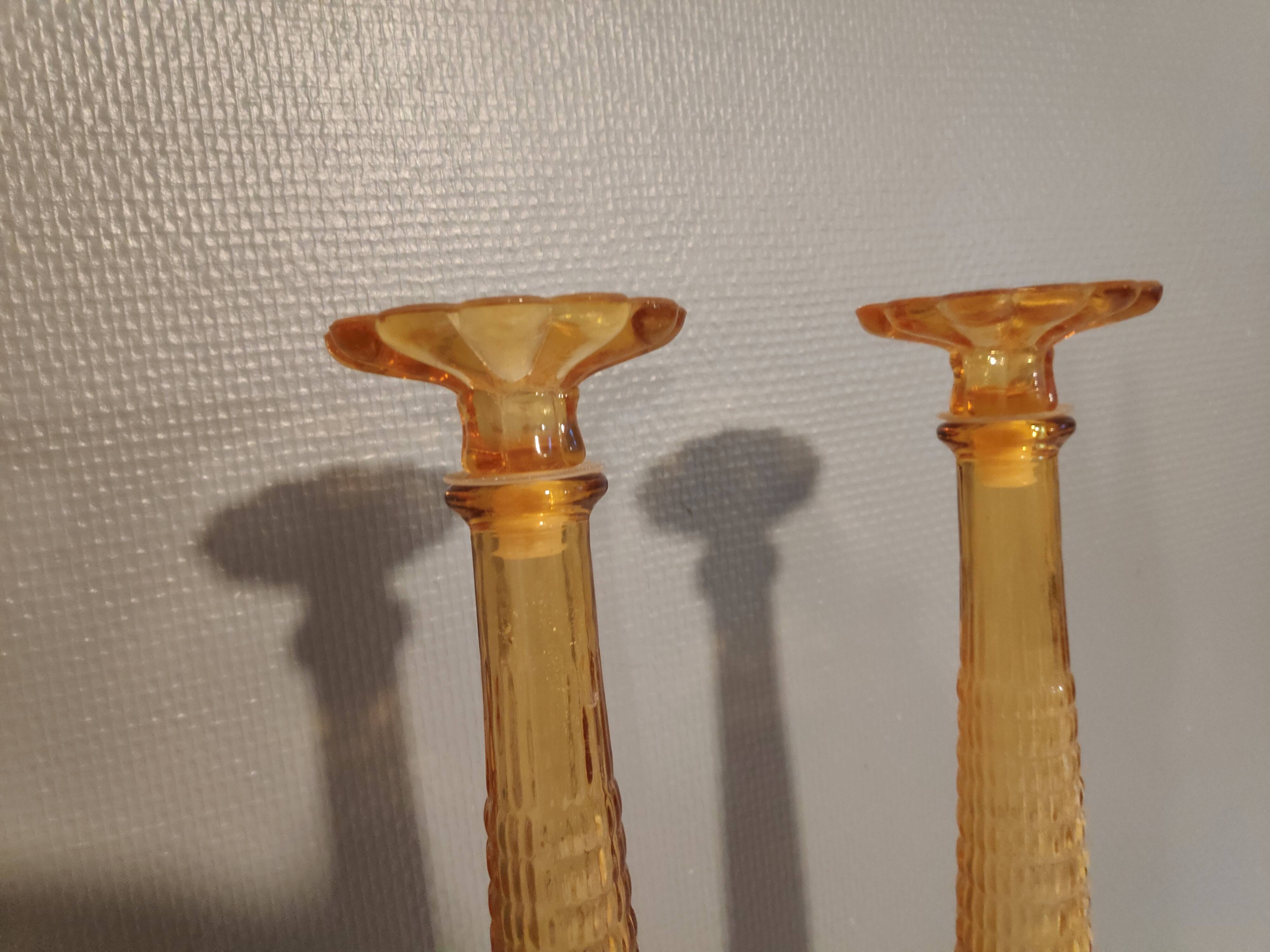 Pair of amber-coloured carafes