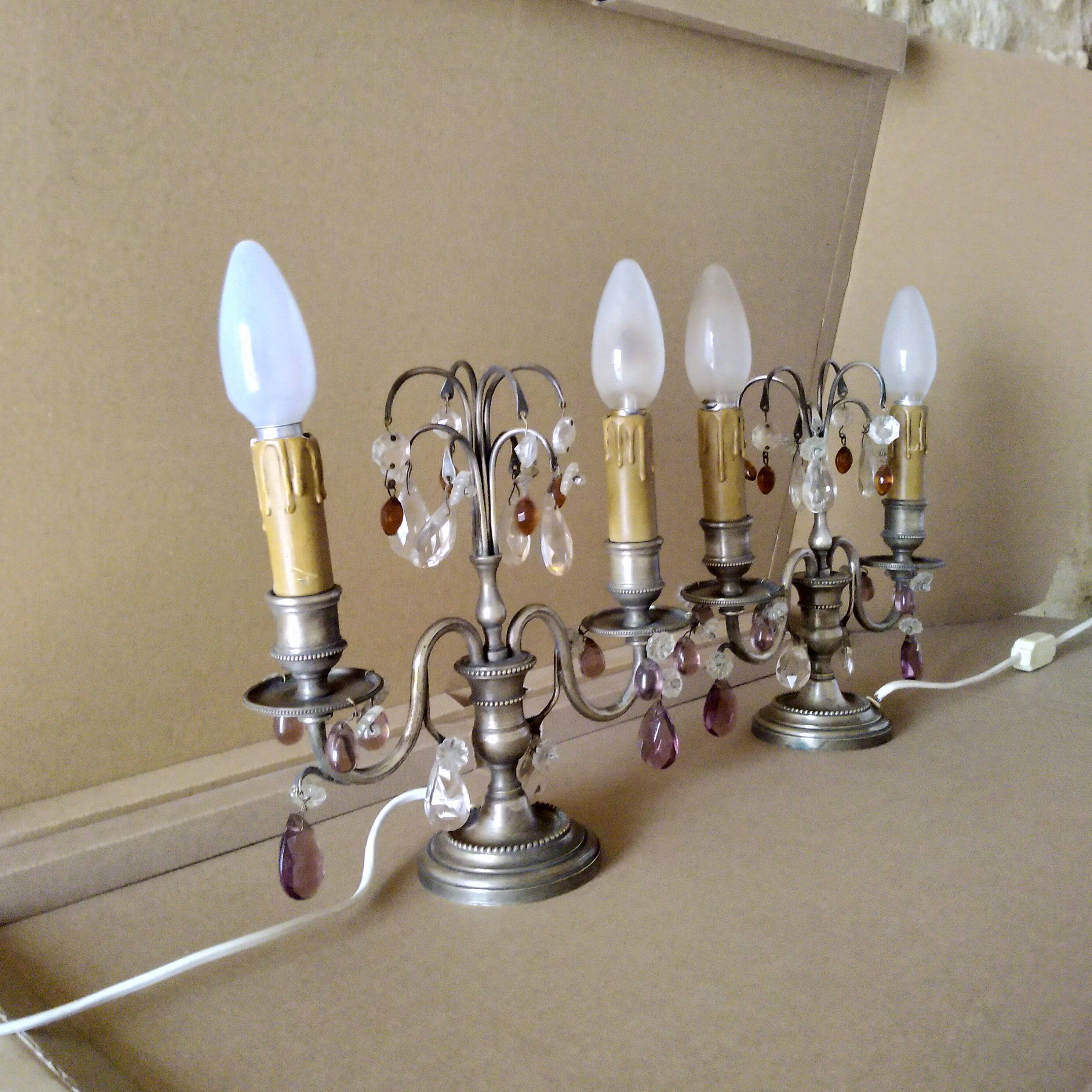 Pair of girandole lamps and silver metal