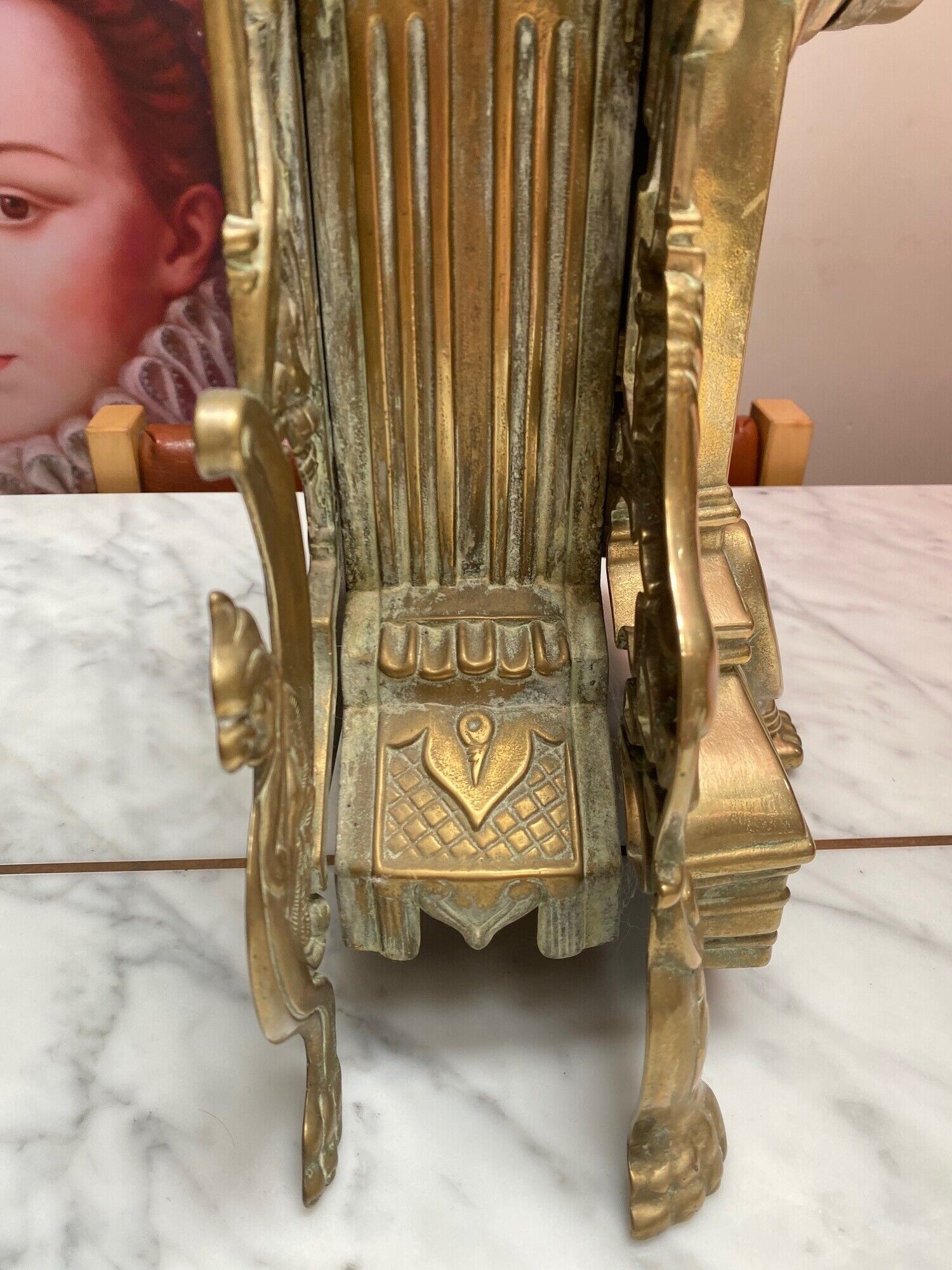 Fireplace trim clock and adornment of antique bronze candelabra