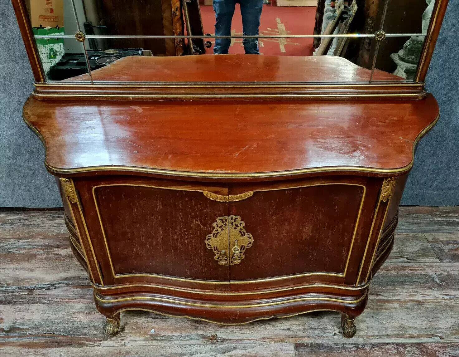 Japanese-style curved door chest of drawers in mahogany and gilded wood sold with its psyche mirror
