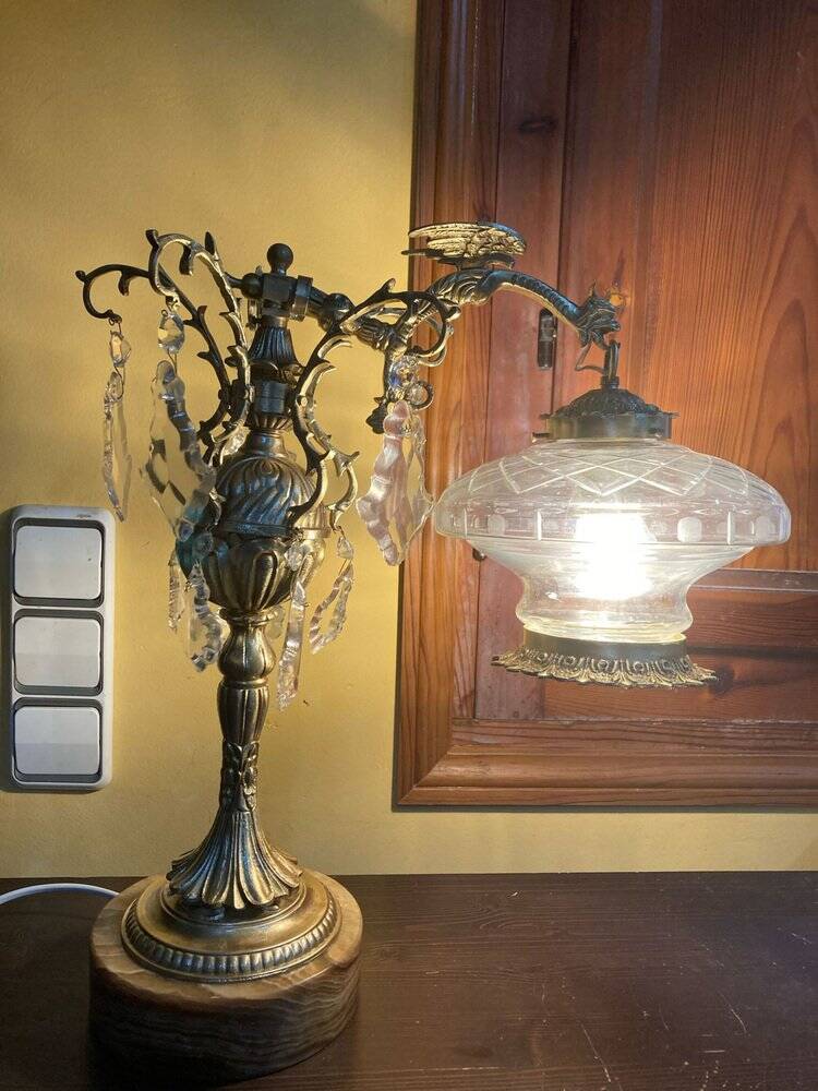 Bronze table lamp with dragon arm and cut glass shade, 1940s